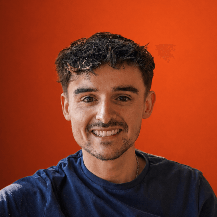 A photo of Patrick Cantellow looking directly to camera with a smile